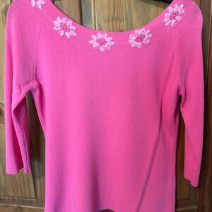 Top (pink with light white flowers)